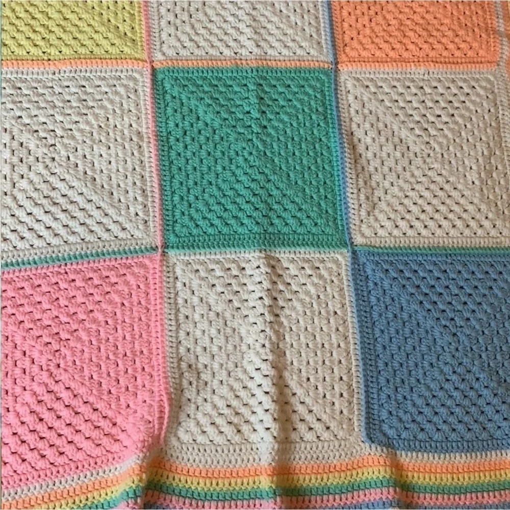 Handmade crochet baby blanket in pastel colors / colorblock pattern